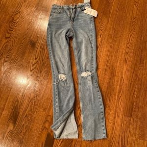 Brand new Zara jeans tags still on